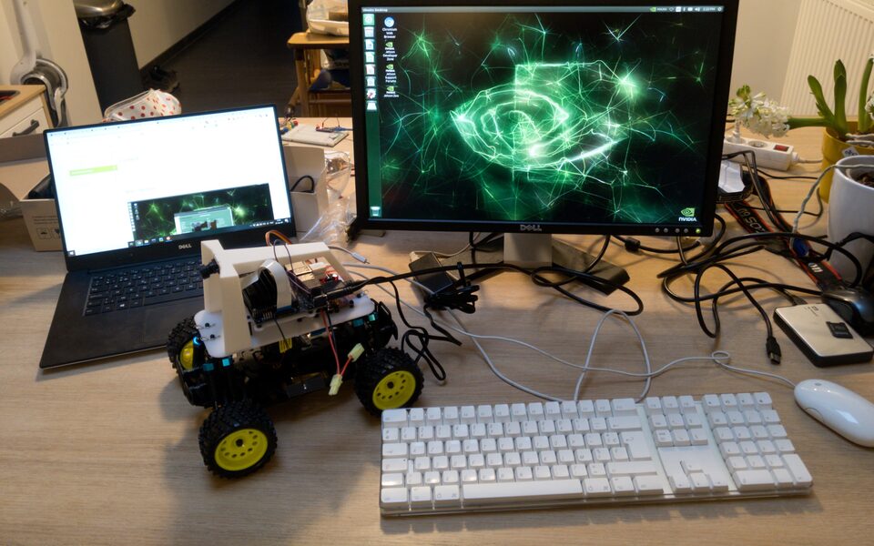 The assembled DonkeyCar with a Jetson Nano on a 3D-printed cage