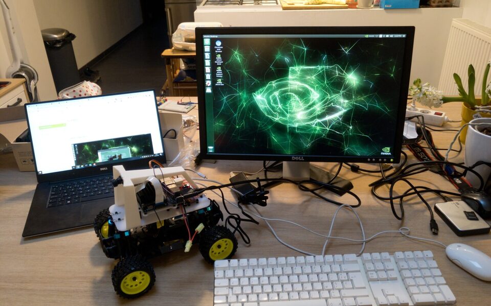 The assembled DonkeyCar with a Jetson Nano on a 3D-printed cage